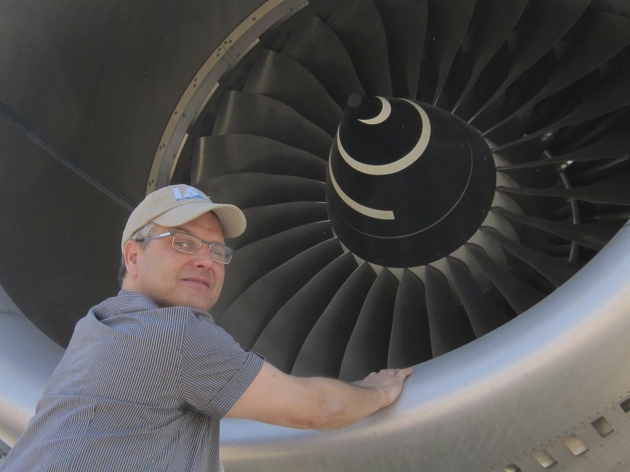 IAS consultant conducting aircraft engine inspection — VVIP private jet asset management and airworthiness compliance